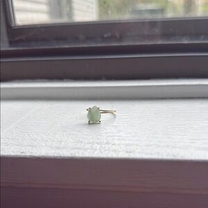 Elegant Gold Ring with Green Stone